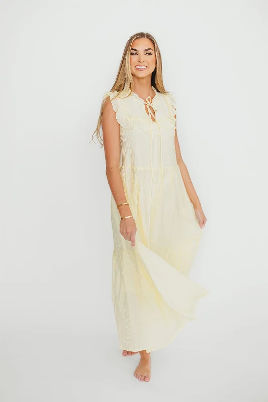 Midi dresses with pleated skirts for a timeless and elegant appeal Brynn Ruffle Tiered Midi Dress in Ecru Midi dresses with pleated skirts for a timeless and elegant appeal Brynn Ruffle Tiered Midi Dress in Ecru