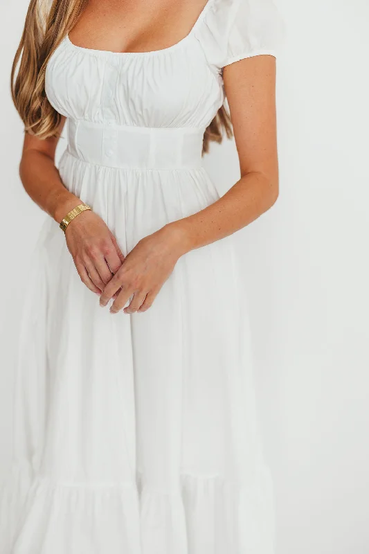 Midi dresses with geometric cutouts for a contemporary and edgy look Hannah Midi Dress in White Midi dresses with geometric cutouts for a contemporary and edgy look Hannah Midi Dress in White