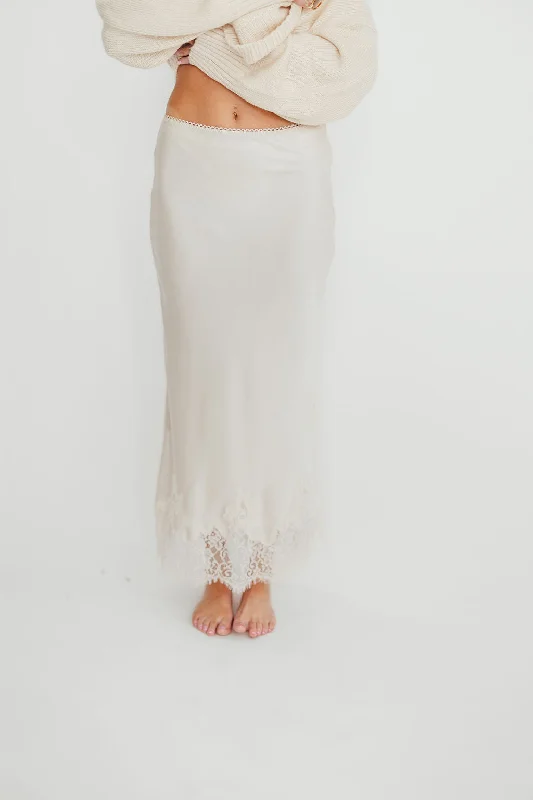 Midi dresses with patchwork patterns for a one - of - a - kind style Isabelle French Lace Midi Skirt in Ivory Midi dresses with patchwork patterns for a one - of - a - kind style Isabelle French Lace Midi Skirt in Ivory