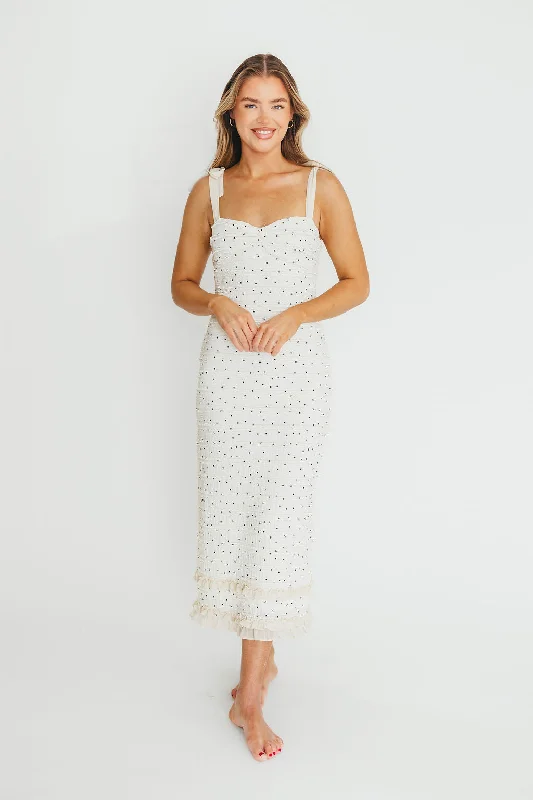 Midi dresses with animal prints for a bold and confident appearance Maddie Tie Strap Ruffled Midi Dress in Ivory Midi dresses with animal prints for a bold and confident appearance Maddie Tie Strap Ruffled Midi Dress in Ivory
