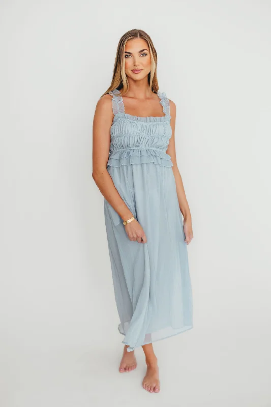 Midi dresses with tiered skirts for a bohemian festival look Demi Ruffle Midi Dress in Blue Midi dresses with tiered skirts for a bohemian festival look Demi Ruffle Midi Dress in Blue