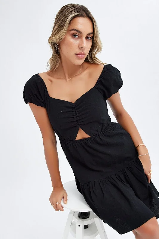 Mini Women Dress with a Short Hem for a Young and Trendy StyleBlack Puff Sleeve Cut Out Skater Dress Mini Women Dress with a Short Hem for a Young and Trendy StyleBlack Puff Sleeve Cut Out Skater Dress