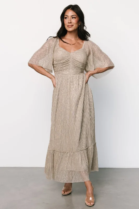 Maxi dresses with polka dot prints for a playful styleElea Shimmer Dress | Champagne Maxi dresses with polka dot prints for a playful styleElea Shimmer Dress | Champagne