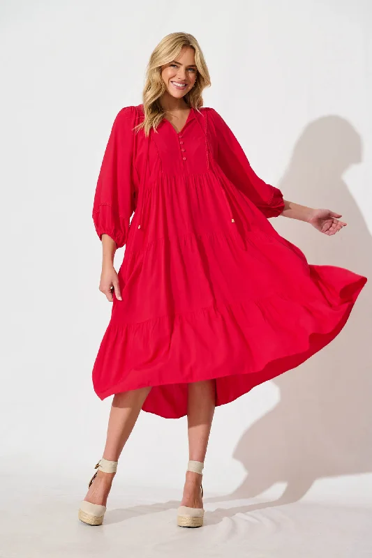 Midi dresses with ruffled sleeves for a more feminine and voluminous lookBarrymore Midi Smock Dress in Red Midi dresses with ruffled sleeves for a more feminine and voluminous lookBarrymore Midi Smock Dress in Red