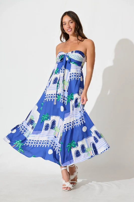 Midi dresses with embroidered accents for a unique and detailed designBlaise Midi Sundress in Blue with White Print Midi dresses with embroidered accents for a unique and detailed designBlaise Midi Sundress in Blue with White Print