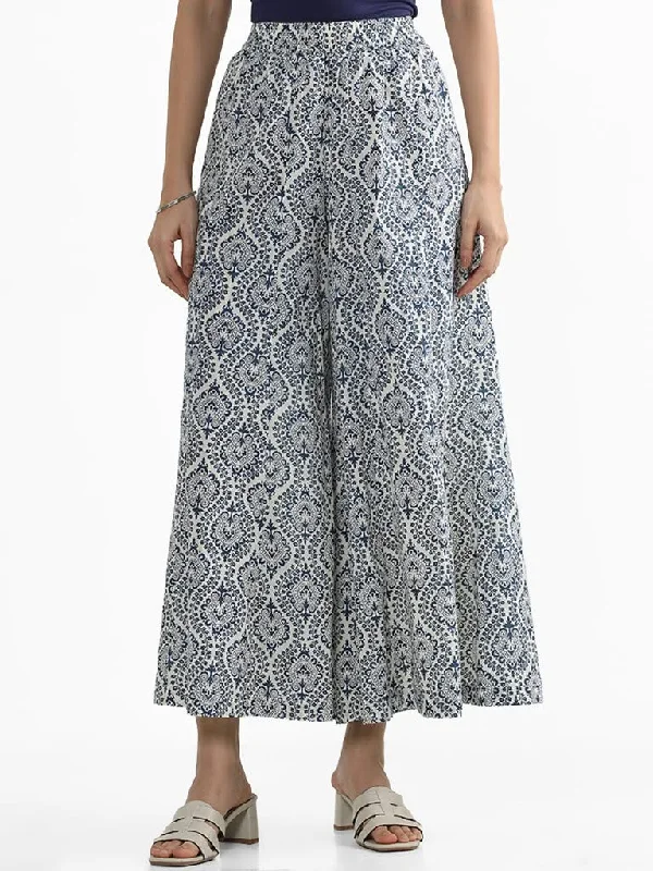 Women's unisex - style casual pants Ripped women jeans for a rebellious and fashion - forward style Utsa Indigo Ethnic Floral Printed Palazzos Women's unisex - style casual pants Ripped women jeans for a rebellious and fashion - forward style Utsa Indigo Ethnic Floral Printed Palazzos
