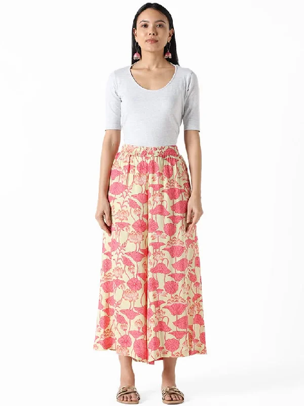 Women's two - piece pant set Ripped women jeans for a rebellious and fashion - forward style Utsa Pink & Beige Printed Floral Lotus Palazzos Women's two - piece pant set Ripped women jeans for a rebellious and fashion - forward style Utsa Pink & Beige Printed Floral Lotus Palazzos