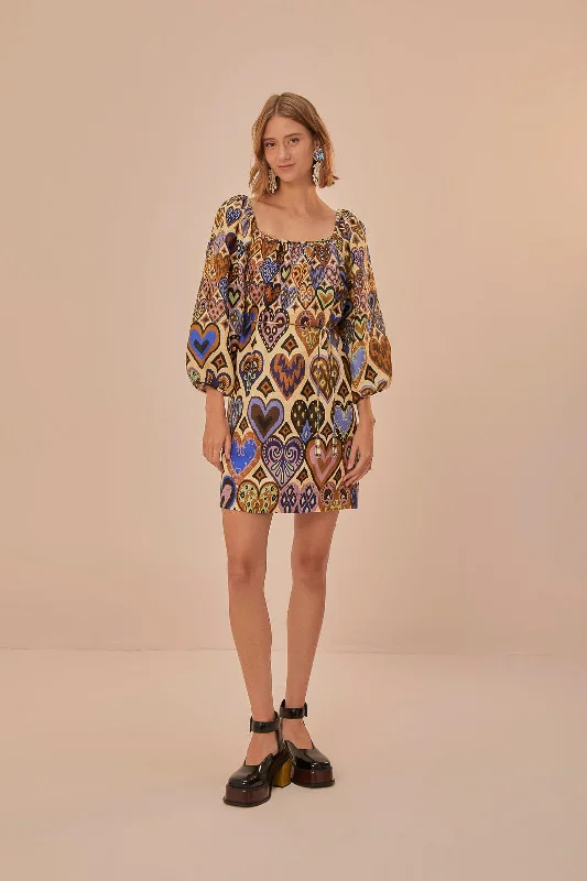 Leather mini dresses for a edgy styleCream Hearts Ikat Long Sleeve Mini Dress