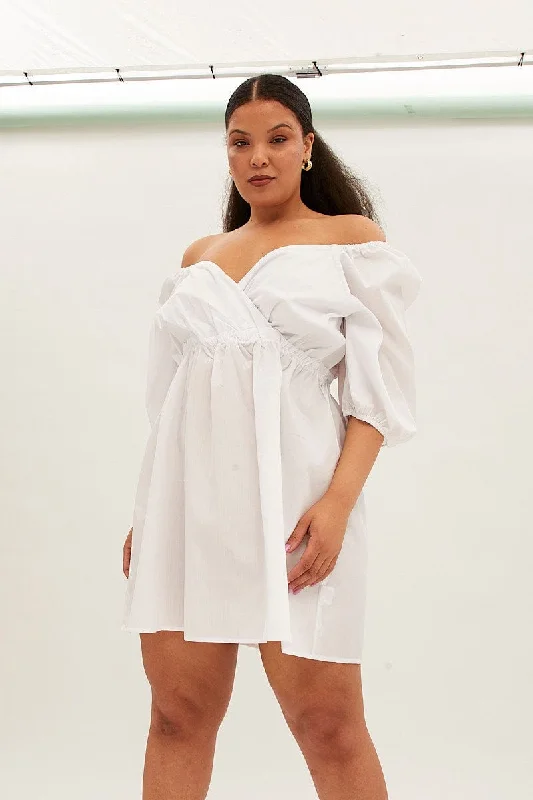 Mini dresses with tassel accents for a fun touchWhite Mini Dress Short Puff Sleeve Gather Detail