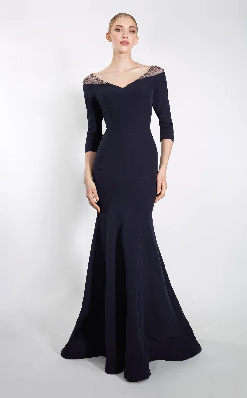 Sequined formal dresses with open backs for a sexy prom styleJanique 23105 Dress